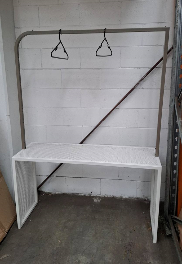 White Table with Clothing Rai